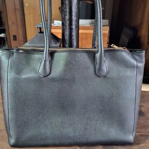 Universal thread black leather tote bag.